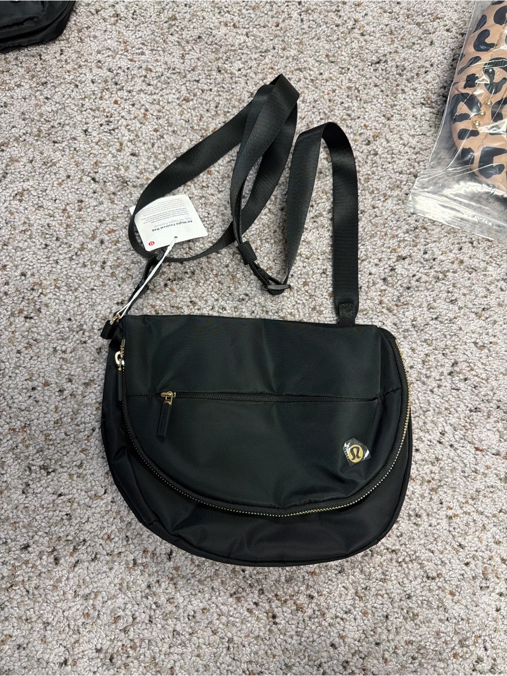 lululemon athletica Black Crossbody Bag with Gold Accents